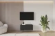 Material: Holzwerkstoff, Material der Rückwand: MDF, Ausführung: Hängend, Größe: 100 cm, Farbe: Schwarz, Zimmer: Wohnzimmer, Anzahl der Türen: 2, Front-Typ: Glatt, Art der Griffe: Griffleiste, Art der Türen: Klapptür, Breite: 100 cm, Tiefe: 40 cm, Höhe: 40 cm, Geschlossene Fächer: 4, Anzahl der Teile: 1 - 1