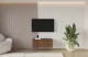 Material: Holzwerkstoff, Material der Rückwand: MDF, Ausführung: Hängend, Größe: 100 cm, Farbe: Schwarz und Katania, Zimmer: Wohnzimmer, Anzahl der Türen: 2, Front-Typ: Gefräste, Art der Griffe: Griffleiste, Art der Türen: Klapptür, Breite: 100 cm, Tiefe: 40 cm, Höhe: 40 cm, Geschlossene Fächer: 4, Anzahl der Teile: 1 - 1