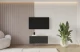 Material: Holzwerkstoff, Material der Rückwand: MDF, Ausführung: Hängend, Größe: 100 cm, Farbe: Artisan und Schwarz, Zimmer: Wohnzimmer, Anzahl der Türen: 2, Front-Typ: Gefräste, Art der Griffe: Griffleiste, Art der Türen: Klapptür, Breite: 100 cm, Tiefe: 40 cm, Höhe: 40 cm, Geschlossene Fächer: 4, Anzahl der Teile: 1 - 1